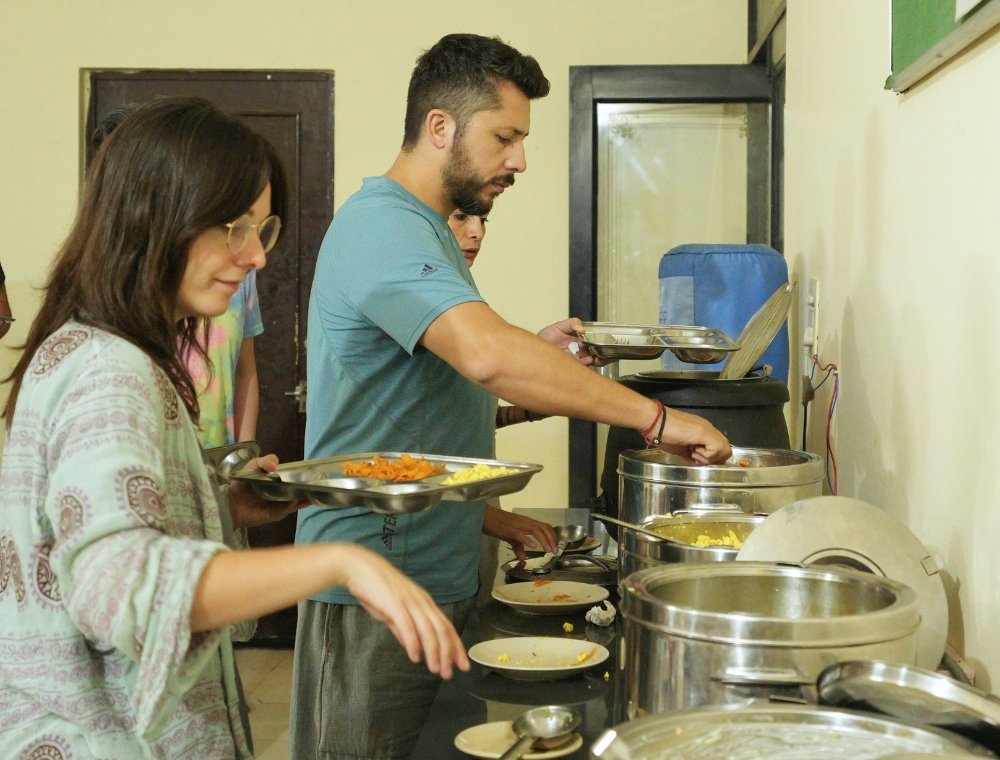 Students dining together at yoga school