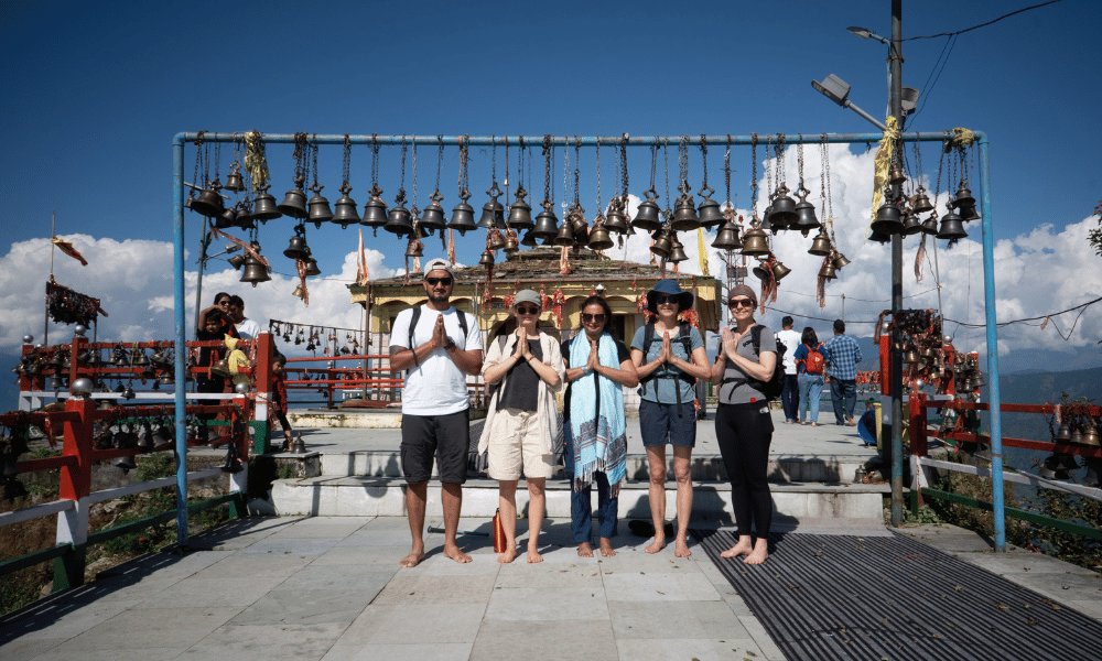 Yoga TTC Students at Kartik Swami Sacred Ridge Temple with Brass Bells
